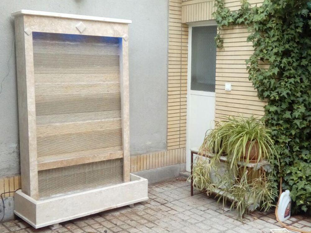 آبنما و حوضچه آب و مجسمه سنگی تزئینی
